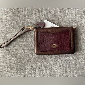 Coach wristlet.